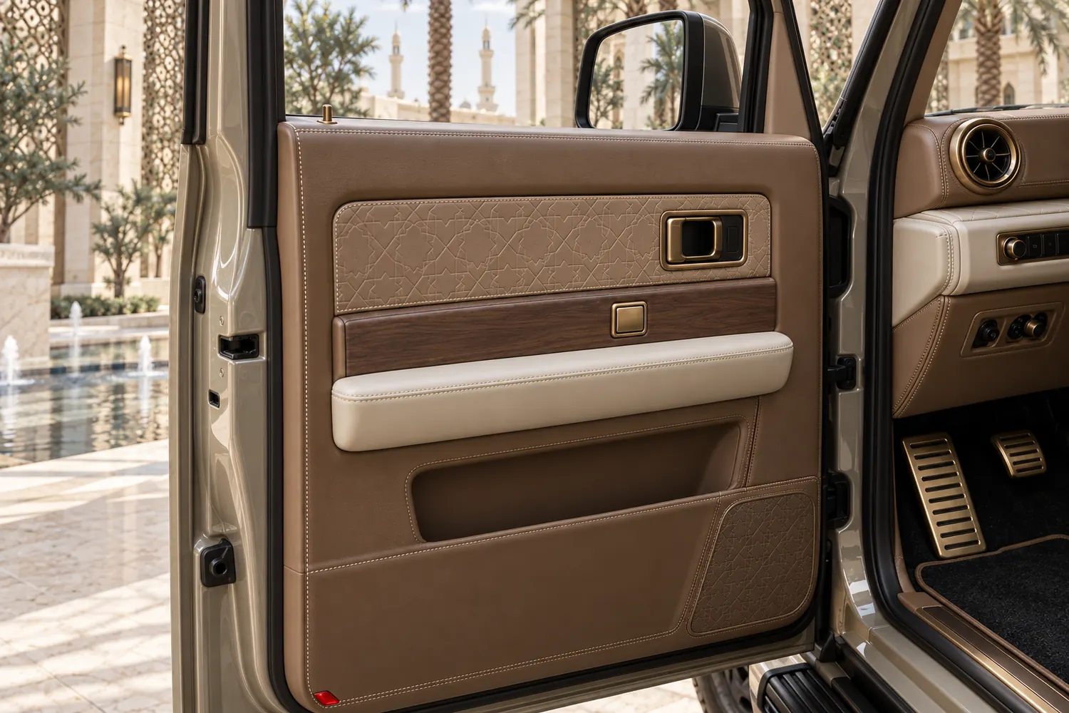 Mocha leather, bone trim and brass stitching on a QAF door card